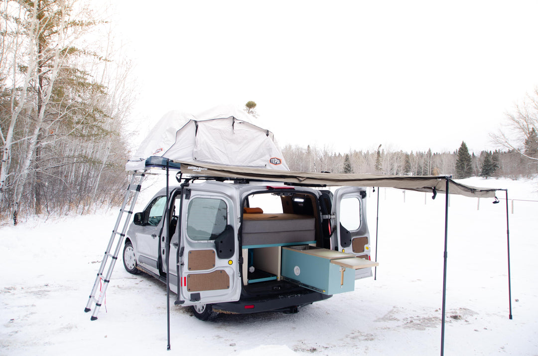 Ford transit van conversion with pullout kitchen and batwing awning